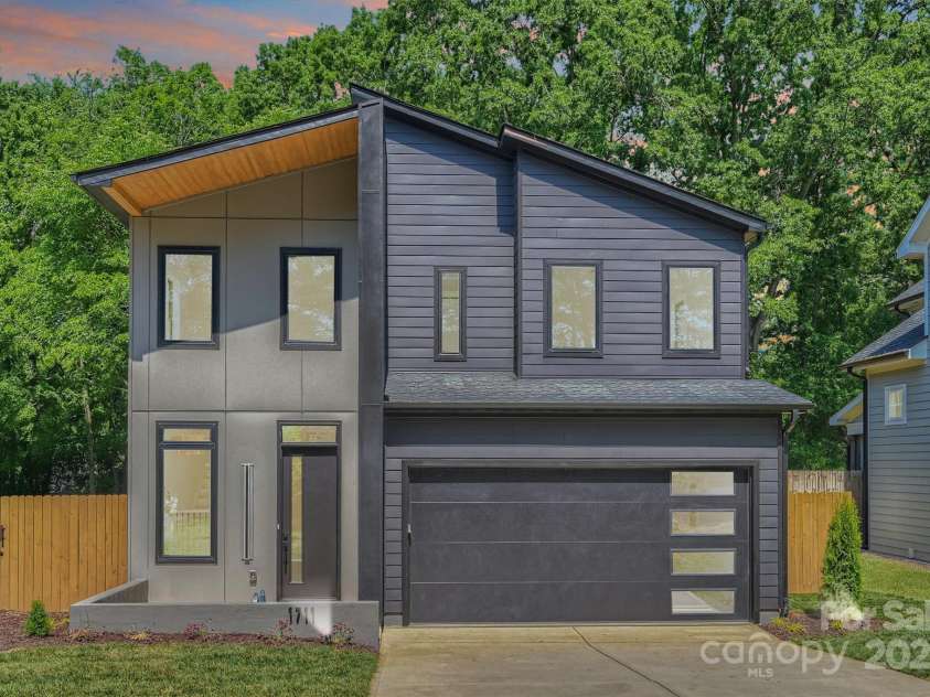1711 Summey Avenue, Charlotte, NC 28205.  MLS# CAR4256760, YatesRealty ID 17598. A little twilight on this new modern in Oakhurst
