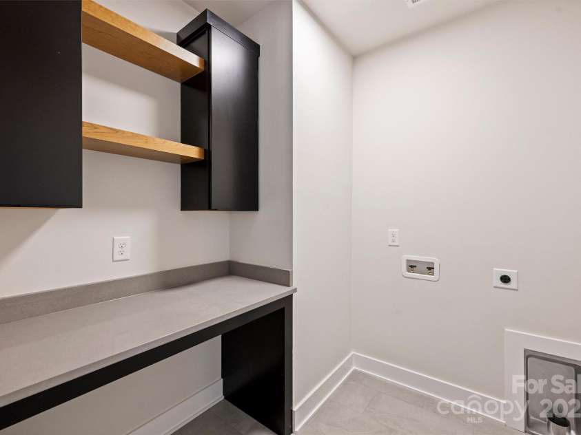 1711 Summey Avenue, Charlotte, NC 28205.  MLS# CAR4256760, YatesRealty ID 17598. Laundry Room