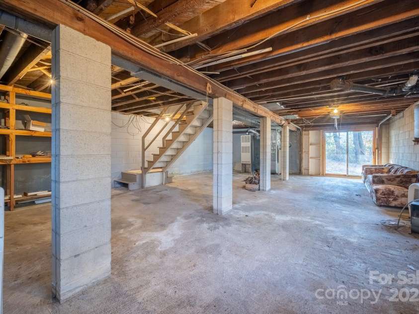 433 Osborne Road, Brevard, NC 28712.  MLS# CAR4330450, YatesRealty ID 1760. Unfinished basement, inside or outside entrance.  