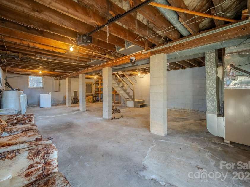 433 Osborne Road, Brevard, NC 28712.  MLS# CAR4330450, YatesRealty ID 1760. Unfinished basement, inside or outside entrance.  