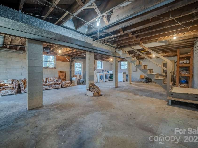 433 Osborne Road, Brevard, NC 28712.  MLS# CAR4330450, YatesRealty ID 1760. Unfinished basement, inside or outside entrance.  