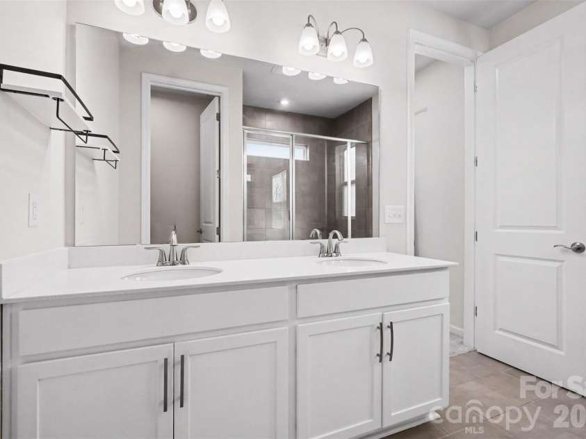 9106 Widden Way, Charlotte, NC 28269.  MLS# CAR4353972, YatesRealty ID 17601. Primary Bathroom