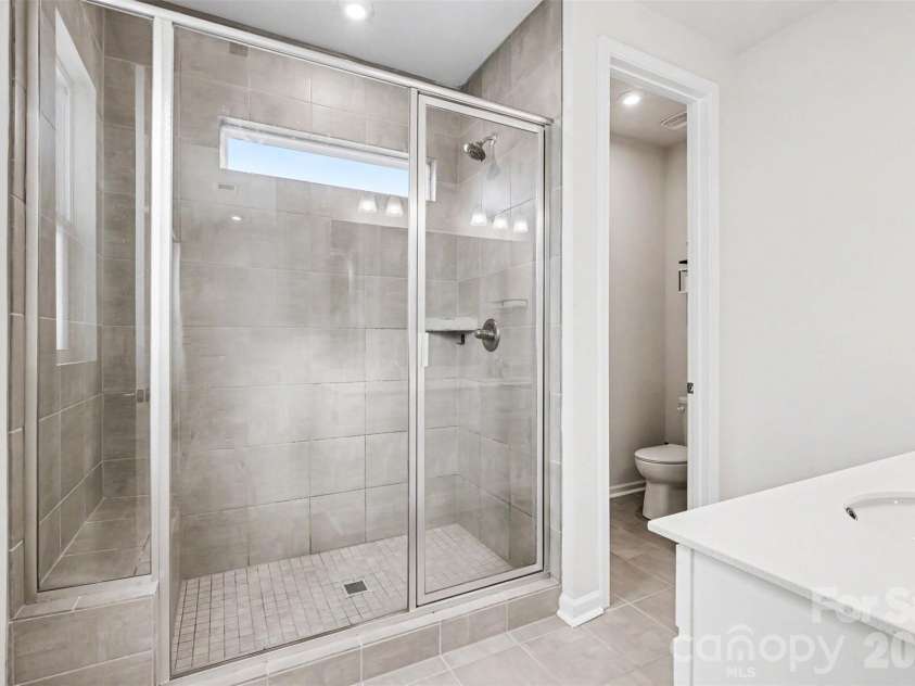 9106 Widden Way, Charlotte, NC 28269.  MLS# CAR4353972, YatesRealty ID 17601. Primary Bathroom