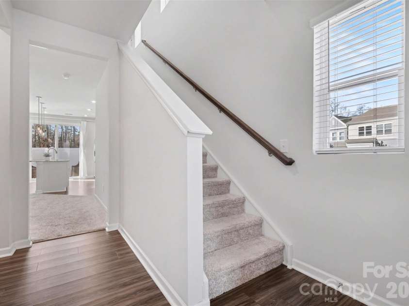 9106 Widden Way, Charlotte, NC 28269.  MLS# CAR4353972, YatesRealty ID 17601. Stairs to 2nd level