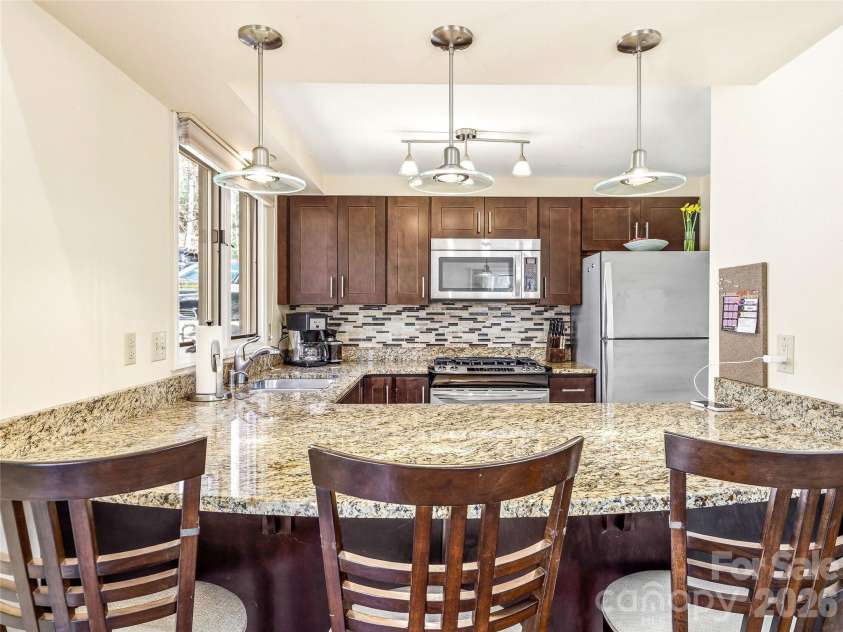 14 Cedarwood Drive, Asheville, NC 28803.  MLS# CAR4357475, YatesRealty ID 17604. Breakfast Bar and Stools Convey with home.