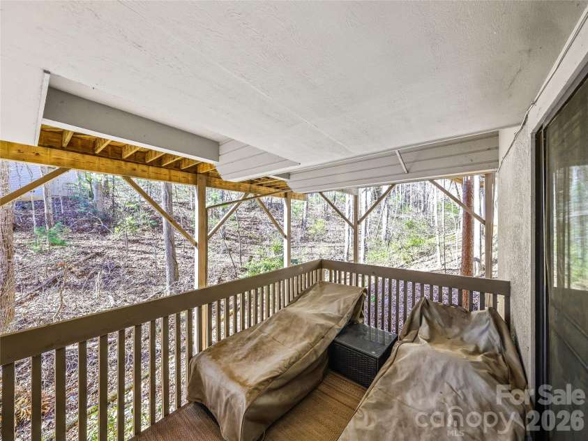 14 Cedarwood Drive, Asheville, NC 28803.  MLS# CAR4357475, YatesRealty ID 17604. Lower Deck for Second Bedroom