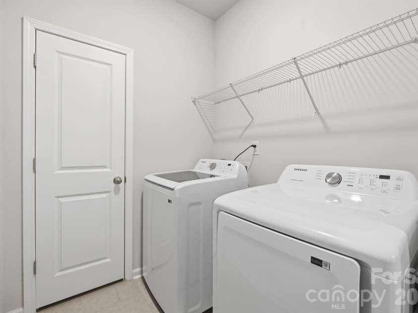 8220 Mccormick Street, Terrell, NC 28682.  MLS# CAR4366340, YatesRealty ID 17612. Laundry Room w/ storage