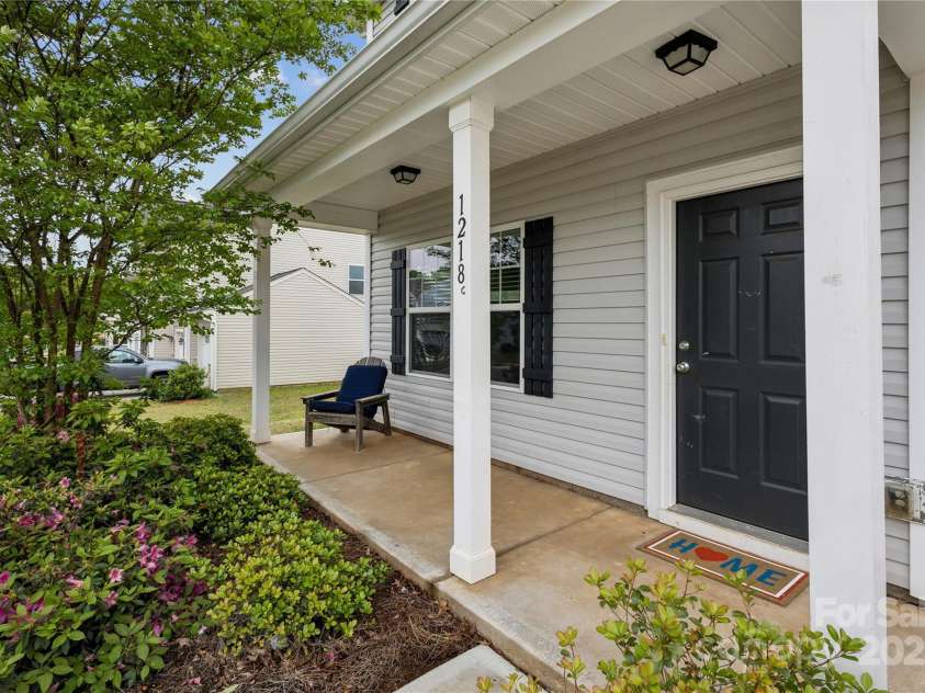 1218 Juddson Drive, Waxhaw, NC 28173.  MLS# CAR4248893, YatesRealty ID 17617. Coverd Front Porch!