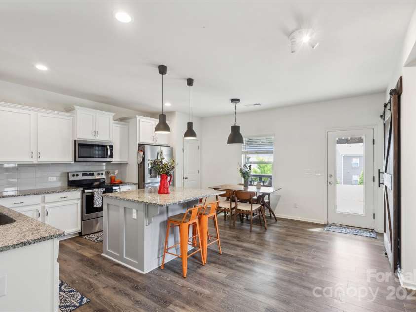 1218 Juddson Drive, Waxhaw, NC 28173.  MLS# CAR4248893, YatesRealty ID 17617. Open kitchen features undercabinet lighting, soft close doors and drawers