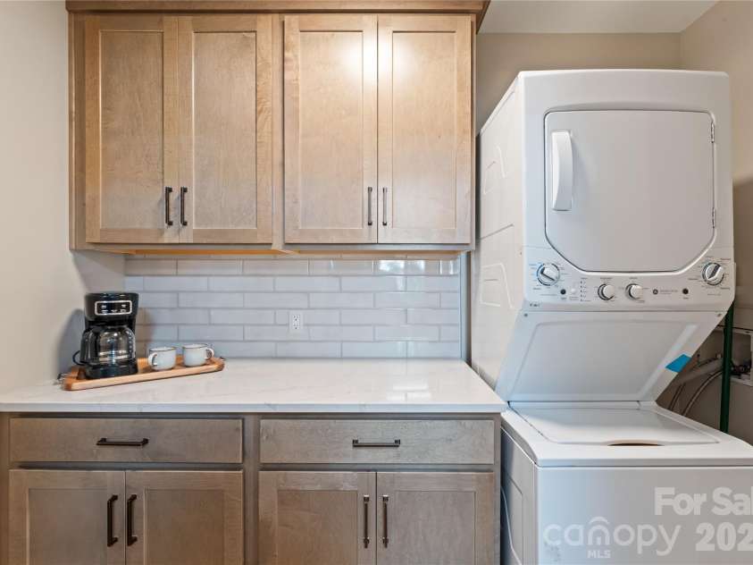 240 Shoreline Loop, Mooresville, NC 28117.  MLS# CAR4375040, YatesRealty ID 17619. Convenient in home laundry area with functional storage space