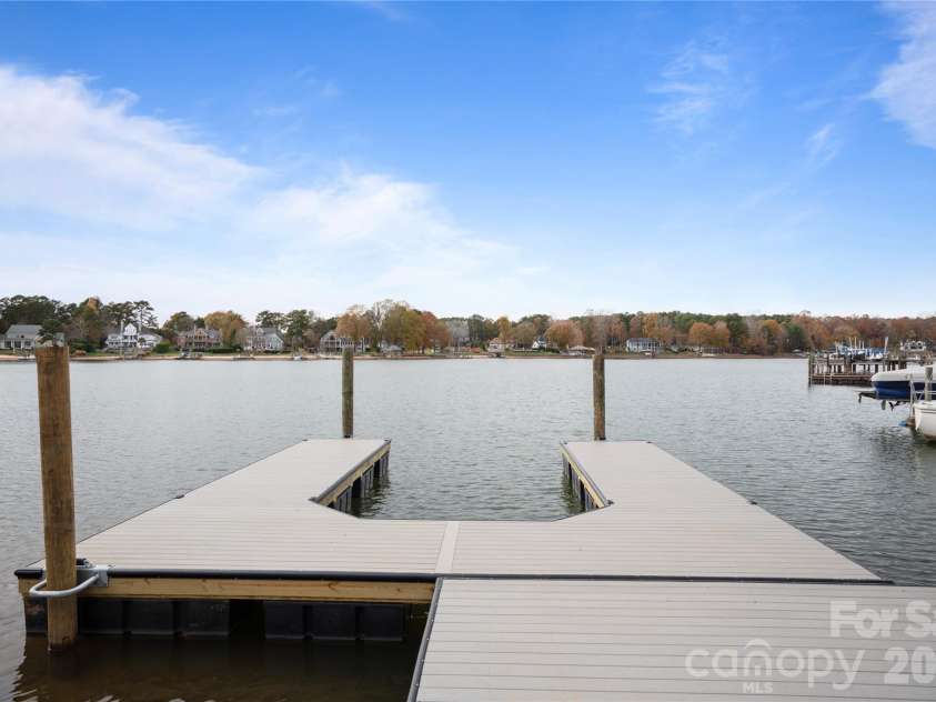 240 Shoreline Loop, Mooresville, NC 28117.  MLS# CAR4375040, YatesRealty ID 17619. Private dock positioned to capture wide open water views offering both privacy and accessibility. Ideal for buyers seeking a premium waterfront setting
