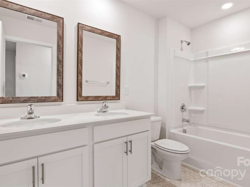 64 Lillian Lane, Hendersonville, NC 28792.  MLS# CAR4260134, YatesRealty ID 17619. Photos are representative