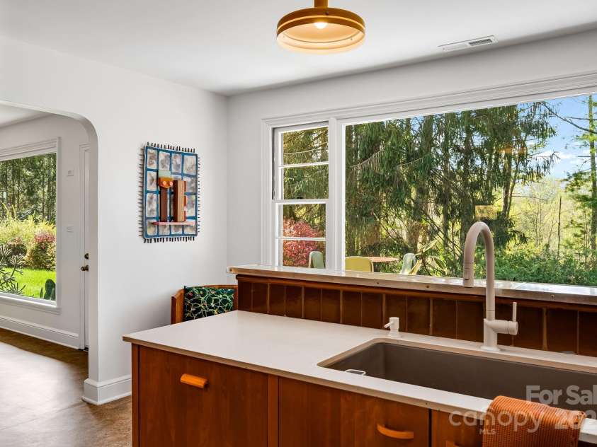 80 Sunset Drive, Marshall, NC 28753.  MLS# CAR4246500, YatesRealty ID 17627. South facing, passive solar design