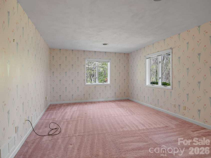 140 Meadowlark Drive, Tryon, NC 28782.  MLS# CAR4364731, YatesRealty ID 17628. 2nd Guest bedroom in basement