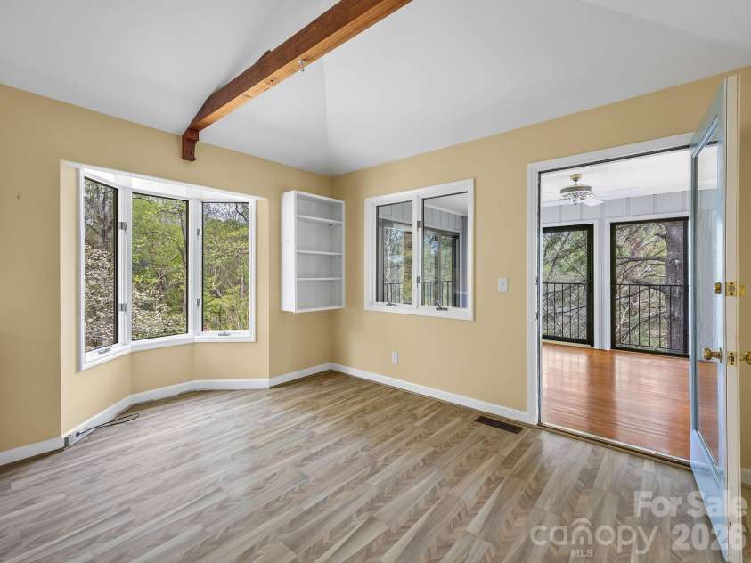 140 Meadowlark Drive, Tryon, NC 28782.  MLS# CAR4364731, YatesRealty ID 17628. Breakfast area has direct access to the sunroom
