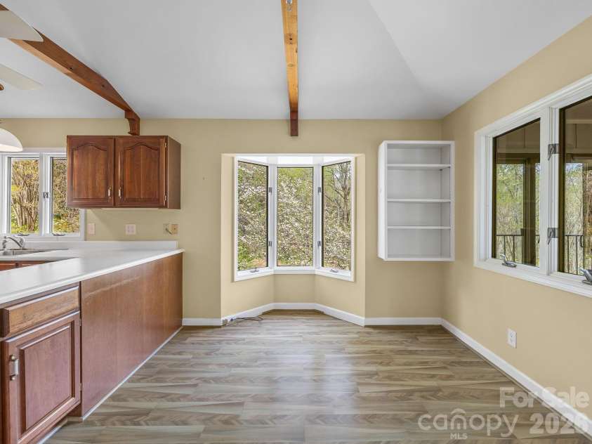 140 Meadowlark Drive, Tryon, NC 28782.  MLS# CAR4364731, YatesRealty ID 17628. Breakfast area is open to Kitchen