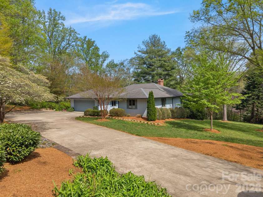 140 Meadowlark Drive, Tryon, NC 28782.  MLS# CAR4364731, YatesRealty ID 17628. Curb View from Meadowlark Drive