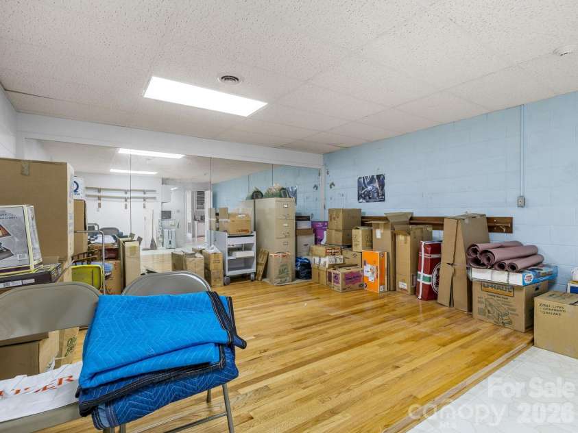 140 Meadowlark Drive, Tryon, NC 28782.  MLS# CAR4364731, YatesRealty ID 17628. Dance studio in basement