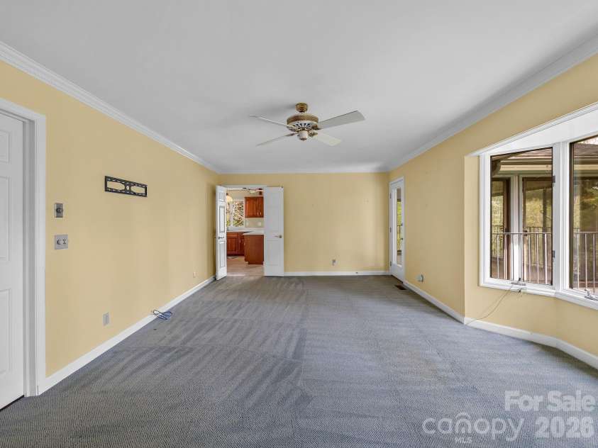 140 Meadowlark Drive, Tryon, NC 28782.  MLS# CAR4364731, YatesRealty ID 17628. Den has direct access to sunroom