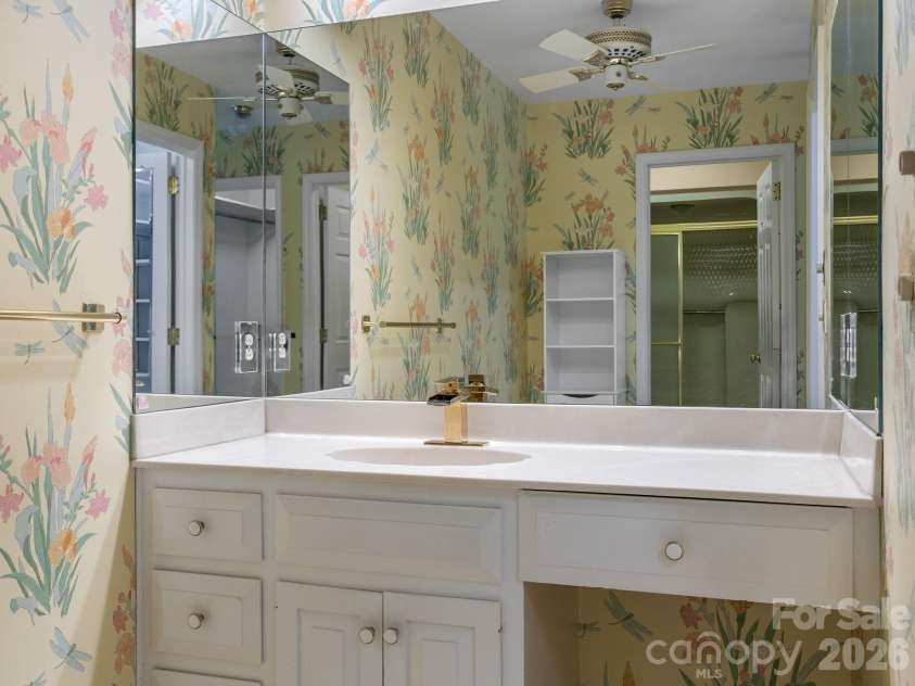 140 Meadowlark Drive, Tryon, NC 28782.  MLS# CAR4364731, YatesRealty ID 17628. Dressing table/vanity in Primary bedroom