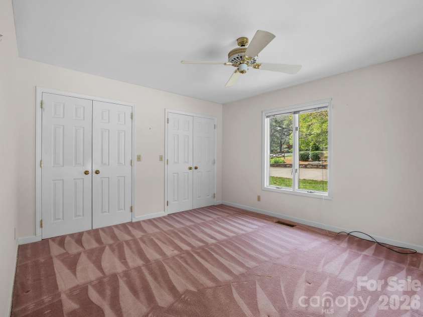140 Meadowlark Drive, Tryon, NC 28782.  MLS# CAR4364731, YatesRealty ID 17628. Guest bedroom on main