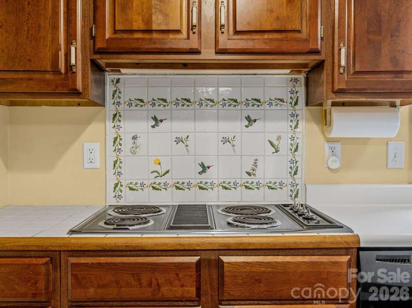 140 Meadowlark Drive, Tryon, NC 28782.  MLS# CAR4364731, YatesRealty ID 17628. Jenn- Air range has other attachments