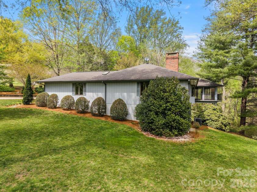 140 Meadowlark Drive, Tryon, NC 28782.  MLS# CAR4364731, YatesRealty ID 17628. Right side of home.