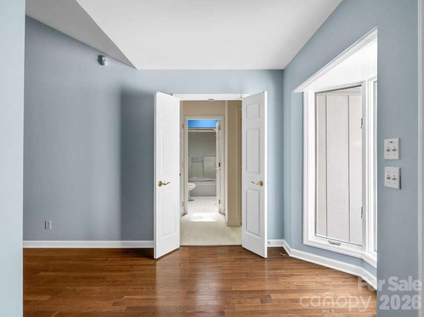 140 Meadowlark Drive, Tryon, NC 28782.  MLS# CAR4364731, YatesRealty ID 17628. Suite on main level with 2nd & 3rd bedrooms and guest bath