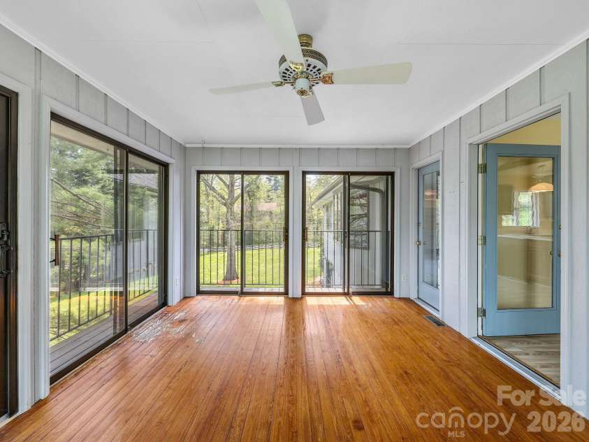 140 Meadowlark Drive, Tryon, NC 28782.  MLS# CAR4364731, YatesRealty ID 17628. Sunroom has access from kitchen/breakfast area & den