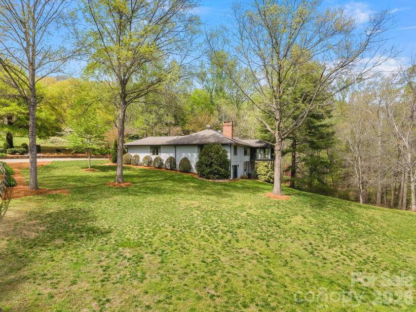 140 Meadowlark Drive, Tryon, NC 28782.  MLS# CAR4364731, YatesRealty ID 17628. Yard