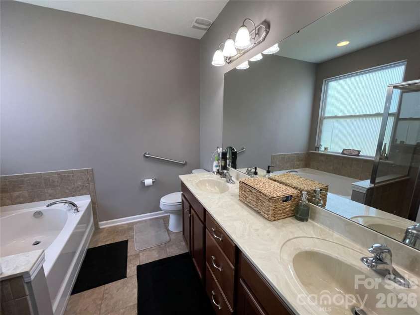 308 Tall Wheat Lane, Mount Holly, NC 28120.  MLS# CAR4306056, YatesRealty ID 17634. Primary Bath