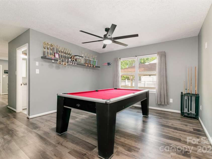 131 Scotland Drive, Mooresville, NC 28115.  MLS# CAR4254939, YatesRealty ID 17636. Additional space in the family room-Spacious enough for a pool table/rec area of additional dining of even larger family room