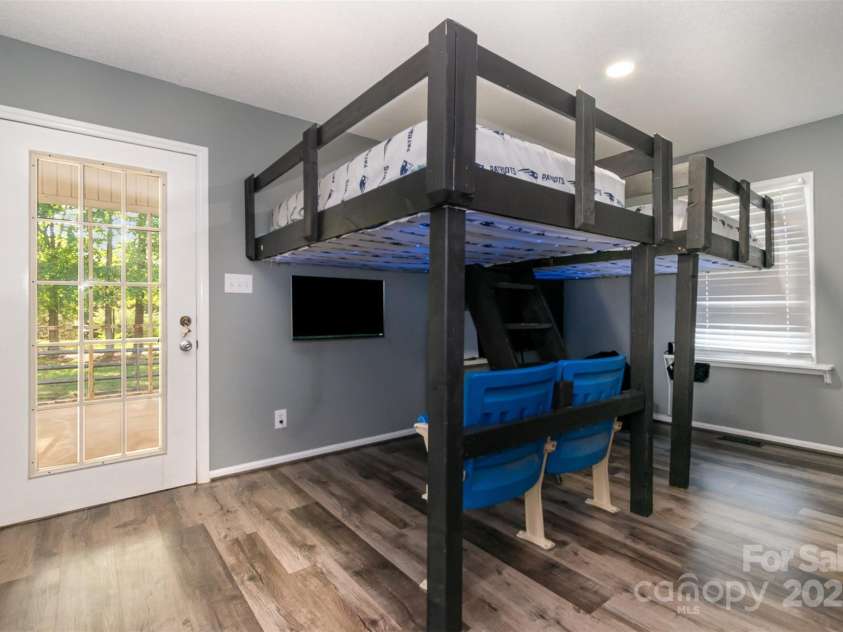 131 Scotland Drive, Mooresville, NC 28115.  MLS# CAR4254939, YatesRealty ID 17636. Downstairs flex/bonus area currently used as a bedroom