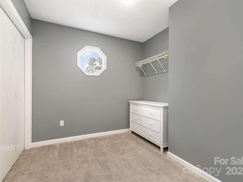 131 Scotland Drive, Mooresville, NC 28115.  MLS# CAR4254939, YatesRealty ID 17636. Primary bedroom attached sitting/exercise/office space