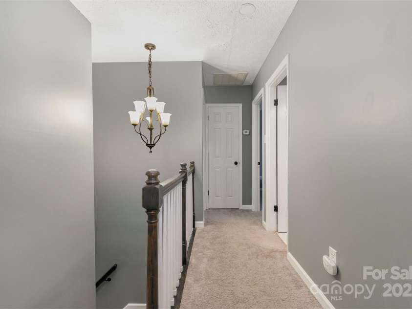 131 Scotland Drive, Mooresville, NC 28115.  MLS# CAR4254939, YatesRealty ID 17636. Upstairs landing