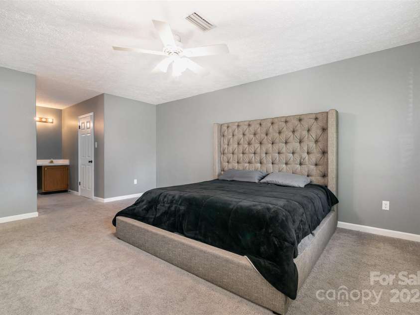 131 Scotland Drive, Mooresville, NC 28115.  MLS# CAR4254939, YatesRealty ID 17636. Upstairs-Primary Bedroom