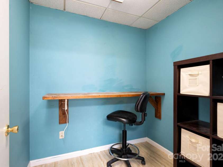 58 Braddock Way, Asheville, NC 28803.  MLS# CAR4246877, YatesRealty ID 17643. Basement Office Area