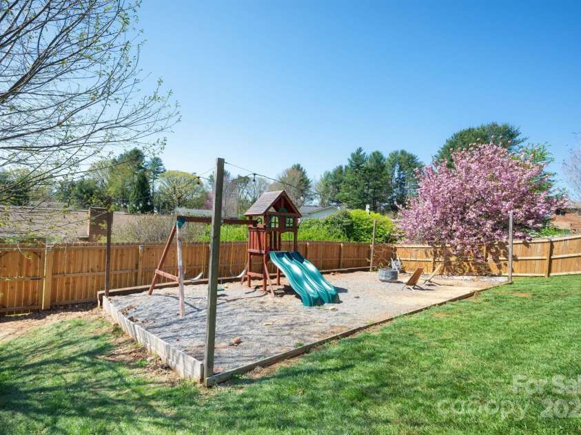58 Braddock Way, Asheville, NC 28803.  MLS# CAR4246877, YatesRealty ID 17643. Gravel Play Area