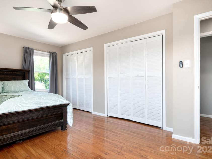 58 Braddock Way, Asheville, NC 28803.  MLS# CAR4246877, YatesRealty ID 17643. Primary Bedroom with Double Closets
