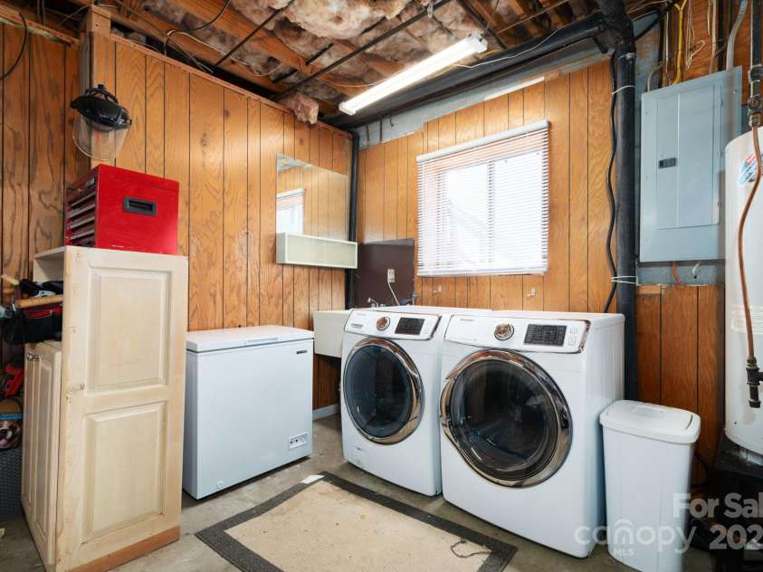 58 Braddock Way, Asheville, NC 28803.  MLS# CAR4246877, YatesRealty ID 17643. Washer/Dryer Corner in Garage