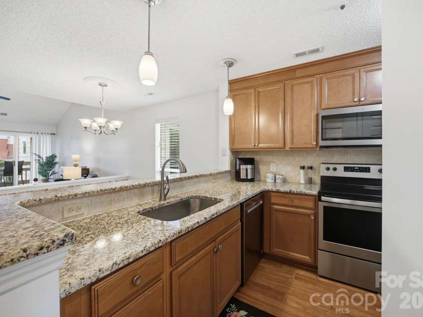 18009 Kings Point Drive, Cornelius, NC 28031.  MLS# CAR4389231, YatesRealty ID 17644. 