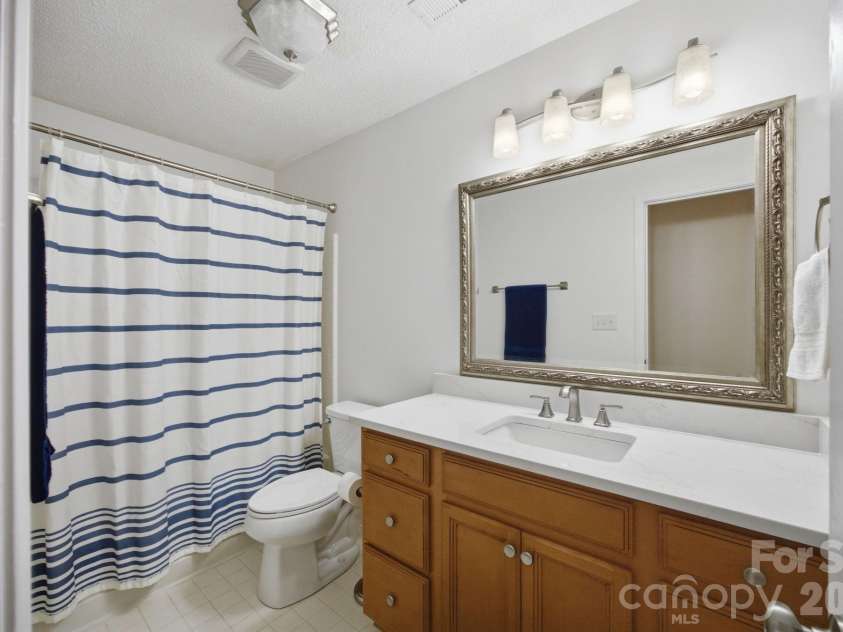 18009 Kings Point Drive, Cornelius, NC 28031.  MLS# CAR4389231, YatesRealty ID 17644. 