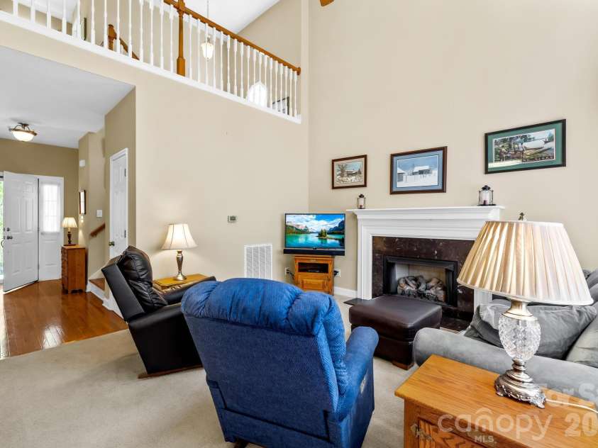 1131 Greenheather Drive, Salisbury, NC 28147.  MLS# CAR4357803, YatesRealty ID 17646. High Ceiling Living Room with Gas Fireplace