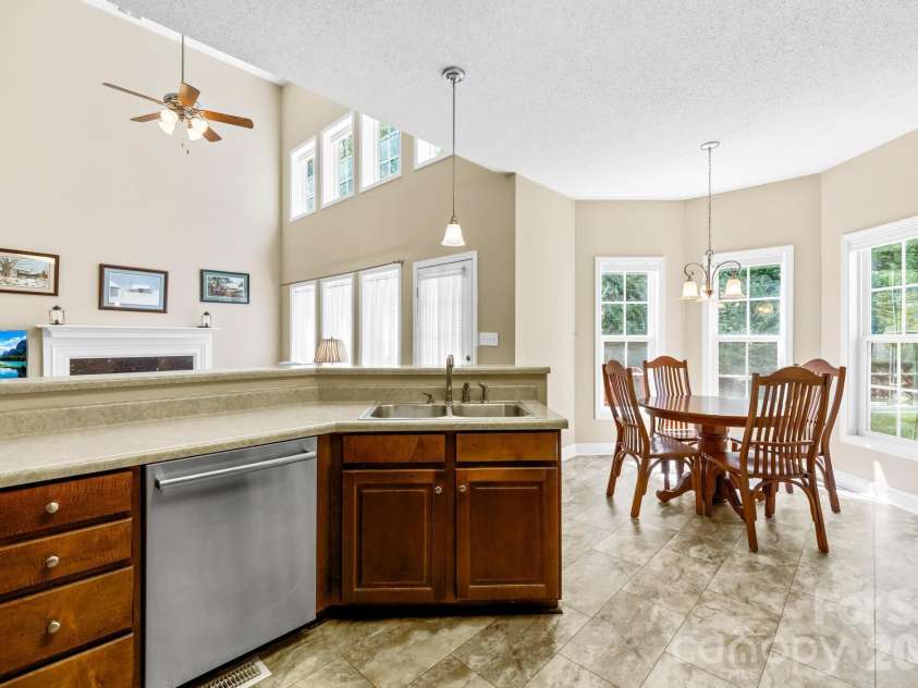 1131 Greenheather Drive, Salisbury, NC 28147.  MLS# CAR4357803, YatesRealty ID 17646. View from Kitchen to Living Room