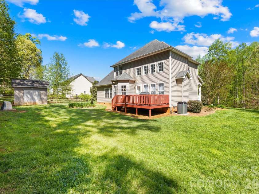 1131 Greenheather Drive, Salisbury, NC 28147.  MLS# CAR4357803, YatesRealty ID 17646. View from the backyard- shed was built on site