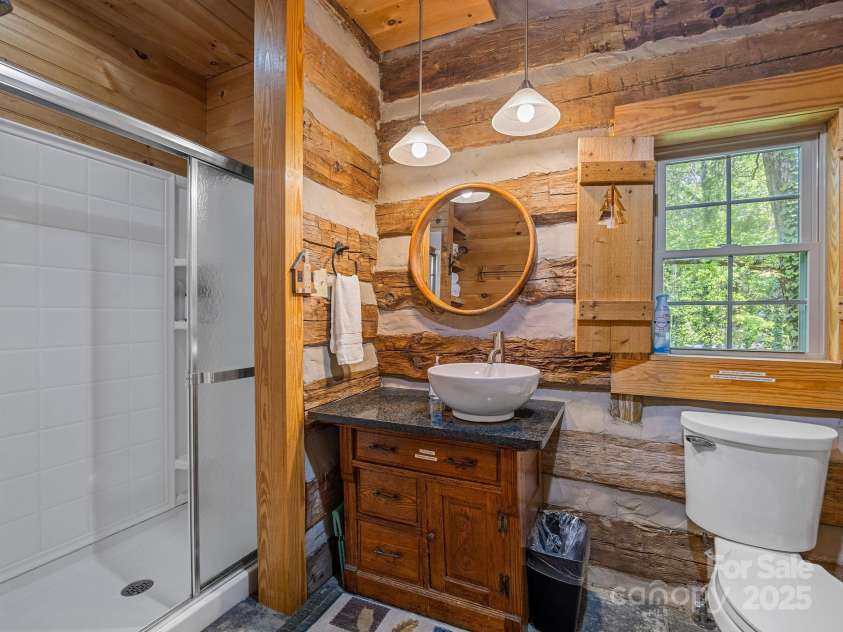 18 Lennox Road, Landrum, SC 29356.  MLS# CAR4253831, YatesRealty ID 17646. Bathroom on the main level.