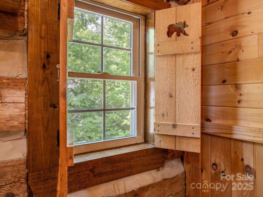 18 Lennox Road, Landrum, SC 29356.  MLS# CAR4253831, YatesRealty ID 17646. Custom shutters throughout with detailed cut-outs.