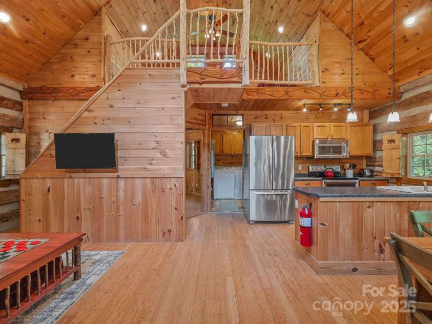 18 Lennox Road, Landrum, SC 29356.  MLS# CAR4253831, YatesRealty ID 17646. Vaulted ceiling, open space, and a spacious loft greet you as you enter.