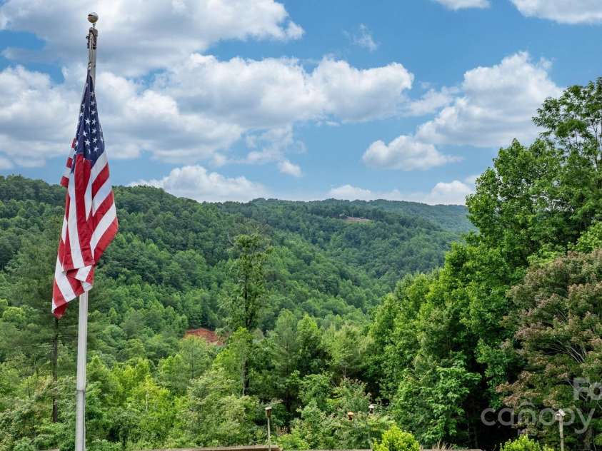 419 Woodpecker Road, Purlear, NC 28665.  MLS# CAR4263807, YatesRealty ID 17650. 