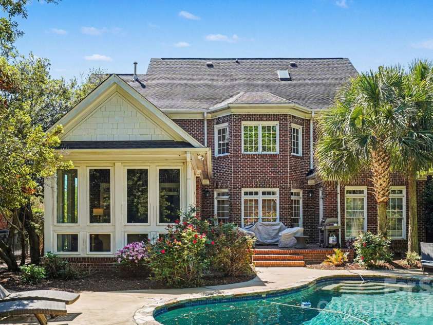 7609 Windaliere Drive, Cornelius, NC 28031.  MLS# CAR4358973, YatesRealty ID 17651. Tropical Back Yard